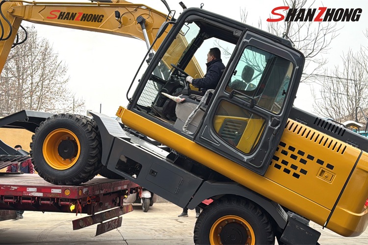 Pelle sur pneus SZL150