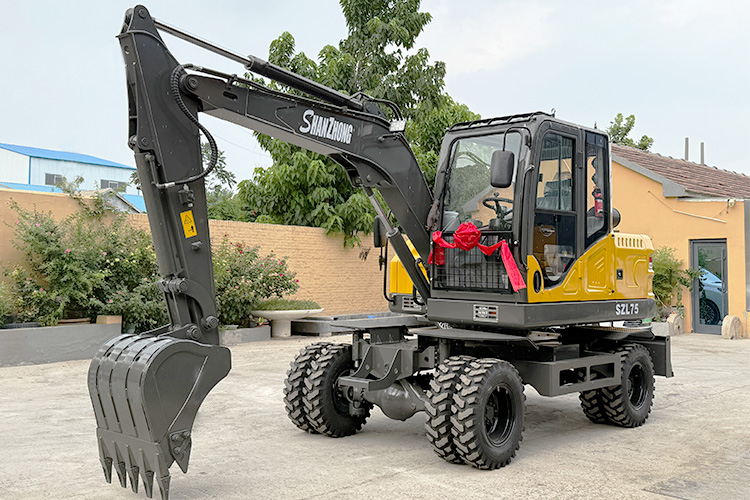 Pelle sur pneus SZL75