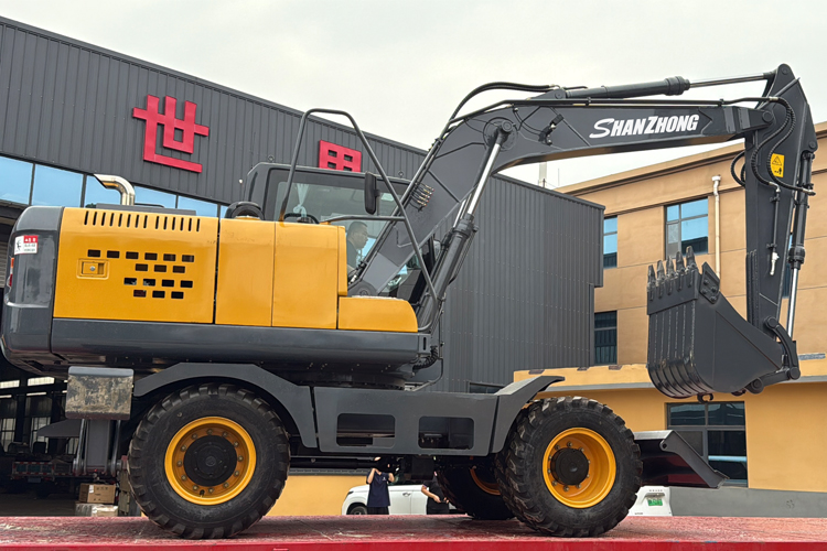 Pelle sur pneus SZL150